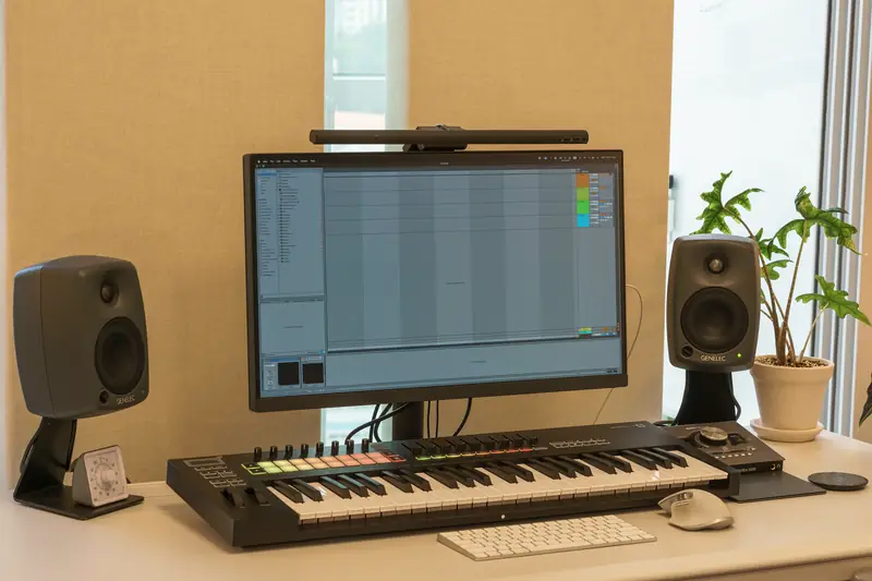 Studio setup: Genelec 8020C monitors, Ableton Live, Novation Launchkey 49